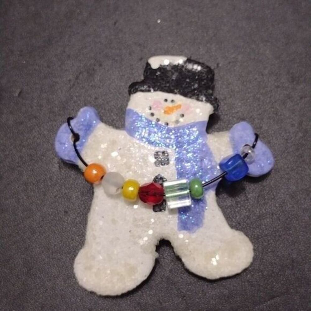 Glittery snowman brooch white blue black